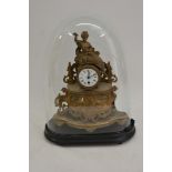 A spelter clock with dome