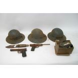 Three II world war tin hats stamped VM5 41 and var