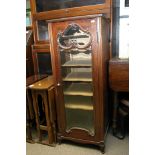 An Edwardian music cabinet.