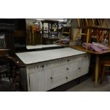 A 1950s chest of drawers and dressing table