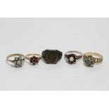 A collection of silver and gilt rings set with var