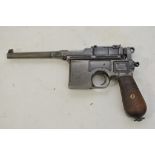 A WWI imperial German c96 auto pistol cocks and dr