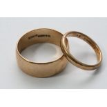 Two gold wedding band rings