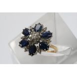 A Diamond and sapphire ring of flower shape