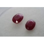 A pair of stunning light red/pinkoval rubies total