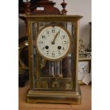 A Victorian four glass mantel clock, with mercury