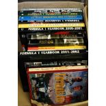 A box containing Formula One books