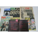 A collection of Beatles magazines and memorabilia