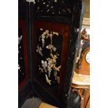 A Quality Japanese two panel  carved hardwood and lacquer screen decorated with raised and applied