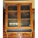 An Edwardian hanging display cabinet, with a pair