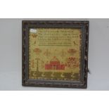 A small Victorian oak framed sampler dated 1842 by