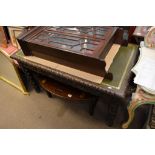 A Victorian oak desk, the green leather top above