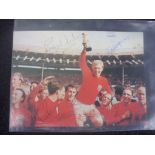 England Signed World Cup 1966 Football Photo: Includes autographs of Bobby Charlton Hurst Peters