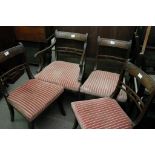 A set of five Regency mahogany dining chairs with drop in seats and inverted legs. and one