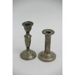 Two small silver candlesticks