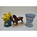 A vintage Basil Brush pottery money box, overpaint