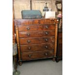 A large Victorian mahogany chest of drawers fitted with two short and four long drawers