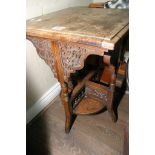 A Colonial type carved table