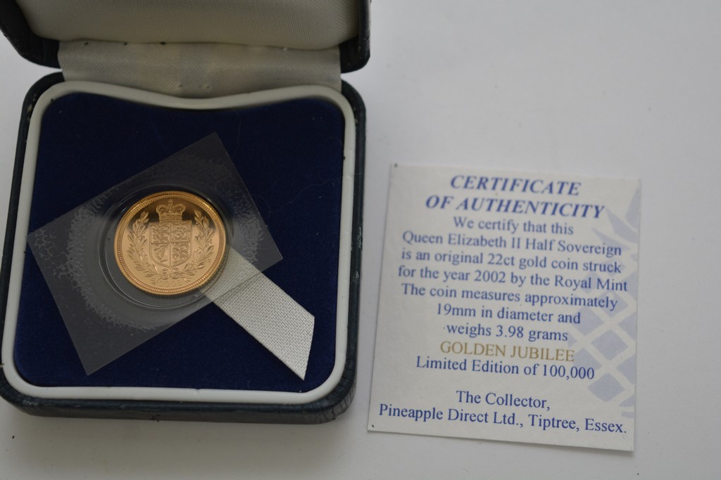 A Cased proof half sovereign limited edition 2002.