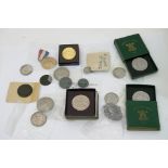 A collection of coins including British and Common