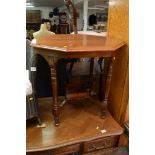 An Edwardian mahogany occasional table, the turned legs united by an under tier