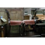 A pair of mid 19th Century walnut balloon back chairs.