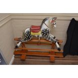 A child's painted antique rocking horse, some dama