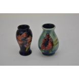 Two miniature Moorcroft vases, one in Hibiscous pa