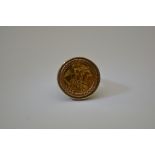 withdrawn - A 9ct gold half sovereign ring.