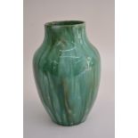 A Pilkington's Lancastrian vase in a running green