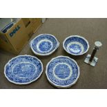 A collection of blue and white china items and a decorative candlestick.