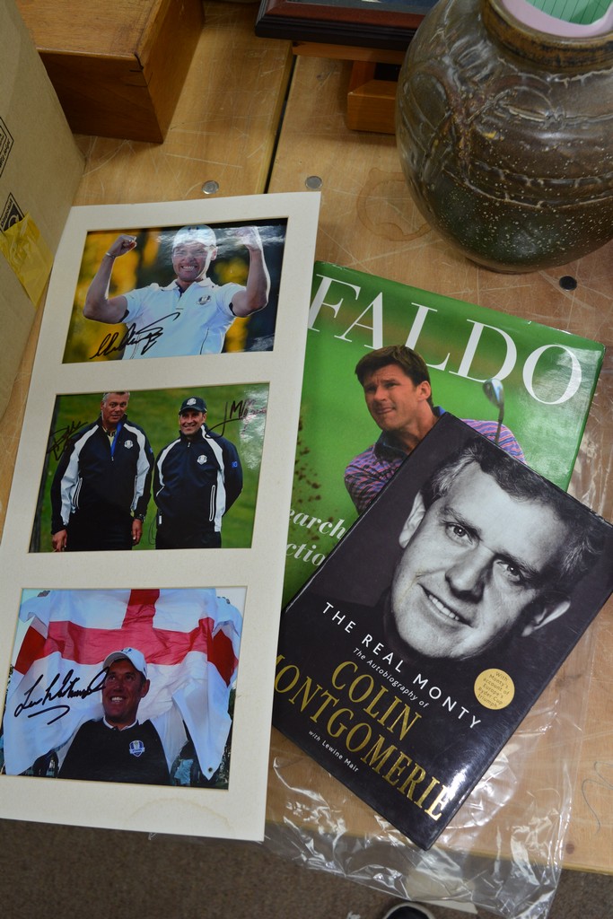 A collection of signed golf items including Nick F