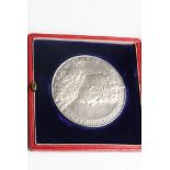 A silver commemorative coronation medal for Edward VII 1902 in original red case and in very good