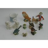 A collection of Beswick birds, a pin head doll and other ceramics