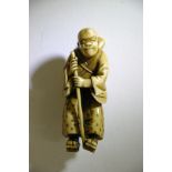 An early 19th Century stained ivory figure in the