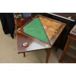 An Edwardian inlaid rosewood envelope card table the hinged quartered top above one drawer on square