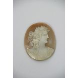 An unmounted oval cameo depicting classical maiden