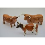 Three Beswick models of Highland cattle