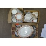 Two boxes containing an extensive 1920's dinner and tea service.