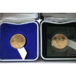 Two gold proof Sovereigns in original boxes.