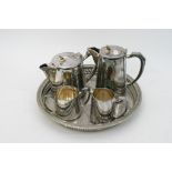 A Mappin and Webb silver plated coffee set on matc