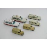 Six loose playworn Dinky ambulances.