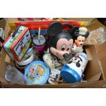 A box containing a Mickey and Minnie mouse items i