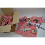 A box of built model aeroplane kits