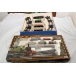 A boxed Hornby " O " gauge clockwork train set ( no key ), together with a boxed Mainline "OO" gauge