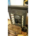 Old cast iron fireplace with art deco pattern tiles, top mantle 114 cm long, overall high 119cm,