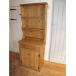 Pine dresser, compact in size, in good aged pine with single drawer and two lower cupboard doors.