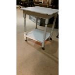 Painted grey two tier trolley on castors 63 cm high, 50 cm sq