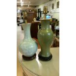 Two green ceramic chinese table lamps, PAT tested, wood bases. 33cm and 30 cm high