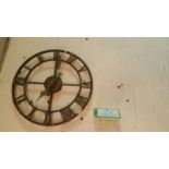 *Wall skeleton clock (battery driven), metal, c 40cm diameter. *This lot will have VAT added to